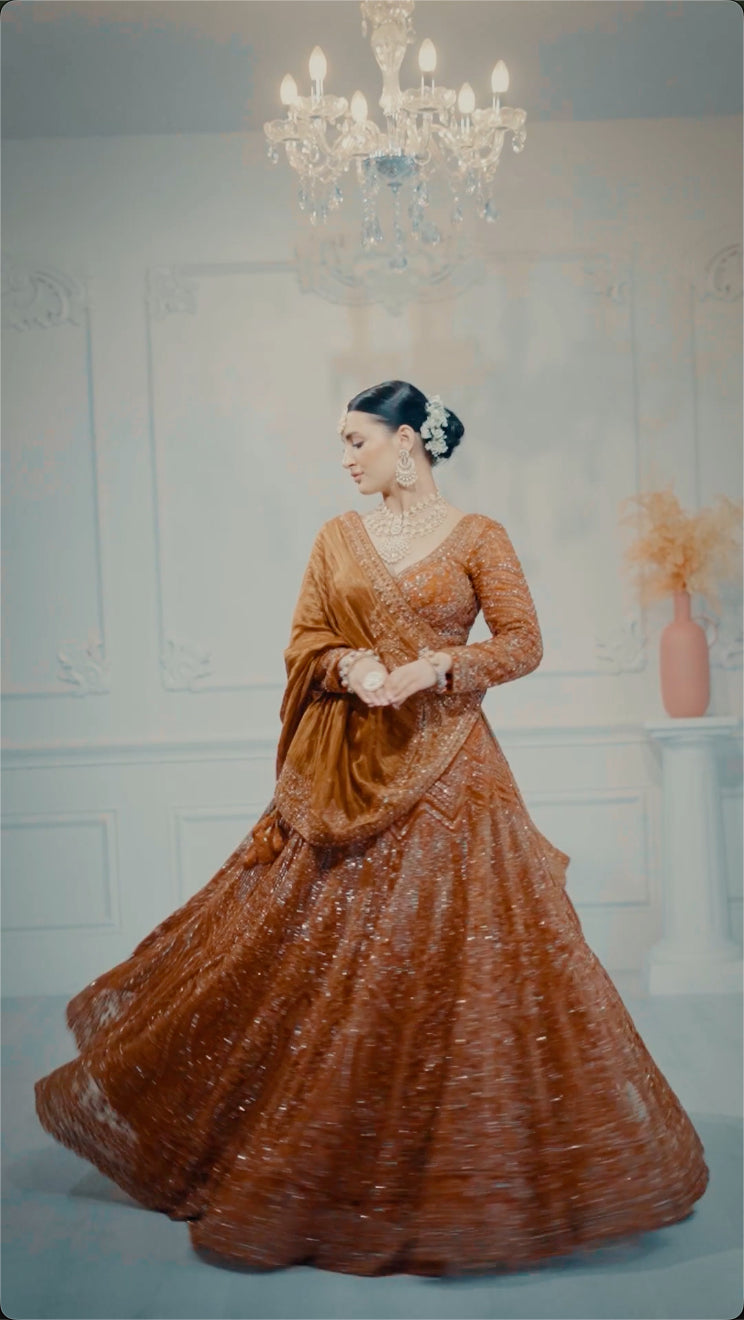 Rust Raw Silk Bridal Lehenga With Buti Work Dupatta